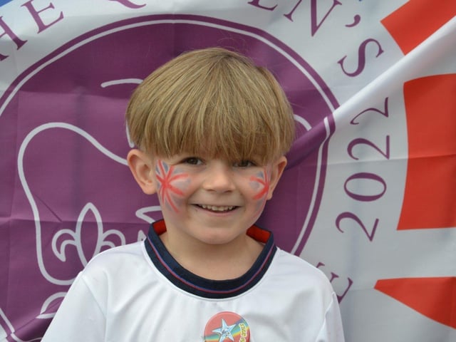Pupils enjoying a Platinum Jubilee street party in the playground of Devonshire Infant School, Southsea