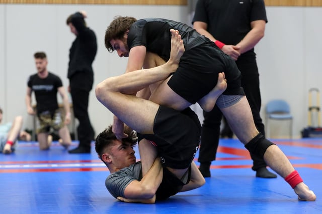 Bradley Fry, top, competing in a Brazilian Jiu Jitsu competition at the Ravelin Centre in Portsmouth. Picture: Chris Moorhouse (jpns 250223-02)