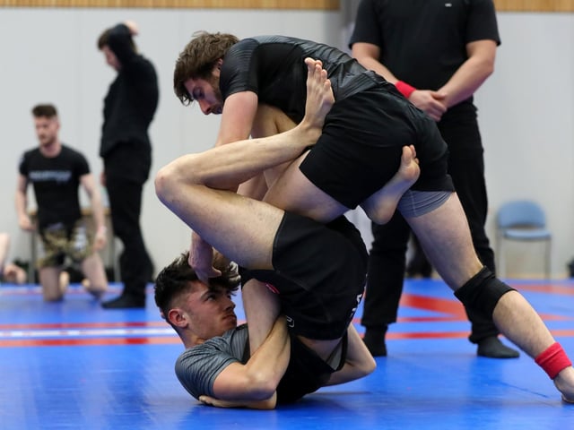 Bradley Fry, top, competing in a Brazilian Jiu Jitsu competition at the Ravelin Centre in Portsmouth. Picture: Chris Moorhouse (jpns 250223-02)
