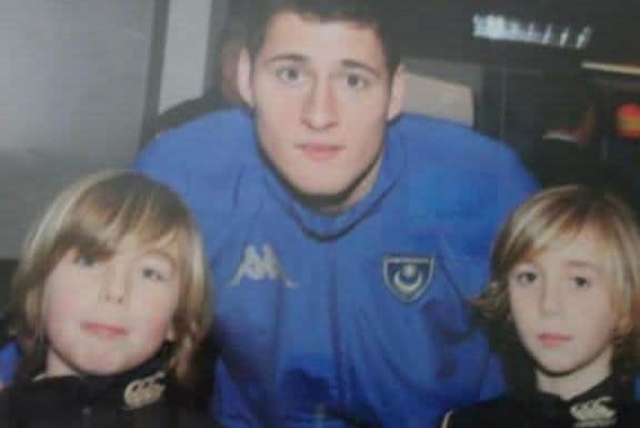 Charlie Bell, far right, and his brother, Alfie, is photographed with Joel Ward