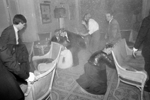 Guests at the Grand Hotel in Brighton, after a bomb attack by the IRA, 12th October 1984. British Prime Minister Margaret Thatcher and many other politicians were staying at the hotel during the Conservative Party conference. Five people were killed and over thirty injured in the bombing. (Photo by John Downing/Getty Images)