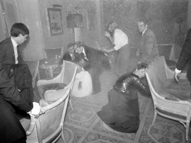 Guests at the Grand Hotel in Brighton, after a bomb attack by the IRA, 12th October 1984. British Prime Minister Margaret Thatcher and many other politicians were staying at the hotel during the Conservative Party conference. Five people were killed and over thirty injured in the bombing. (Photo by John Downing/Getty Images)
