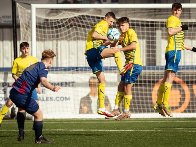 Locks defend from a free-kick. Picture: Keith Woodland
