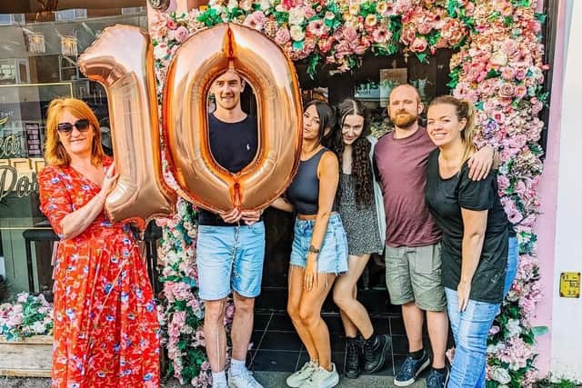Staff at The Tea Party celebrating the business' 10th anniversary last month.