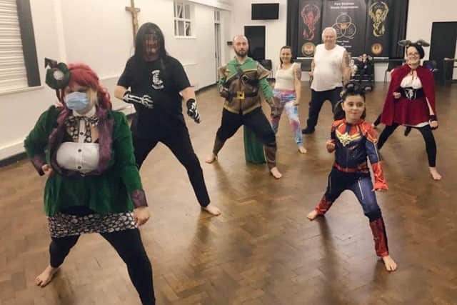 PSKO Karate in Leigh Park ran a Supersiblings Training event to raise money for Adelle Spindlove's book series about children with disabilities. Pictured: People taking part in their costumes