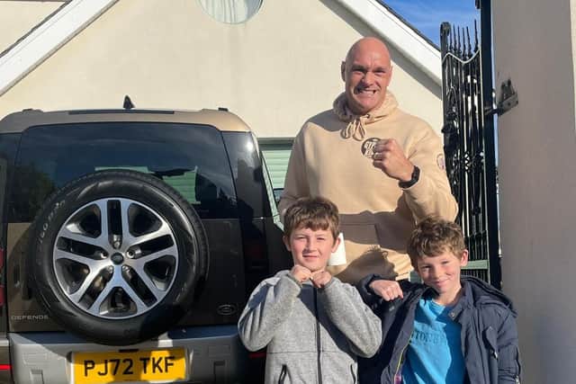 Ollie Milne (right) meets Tyson Fury at Morecambe in November.