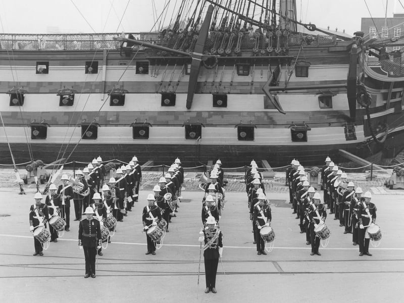Royal Marine Band of the Commander in Chief Naval Home Command alongside HMS Victory in Her Majesty's Naval Base, Portsmouth, 1982. The News PP5161