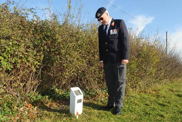 On Friday, October 6 marked 80 years since Hurricane pilot H H Adair lost his life over Portsmouth in the Second World War. Robert Jones (73) laid a remembrance cross at memorial. Picture: Sarah Standing (061120-7954)