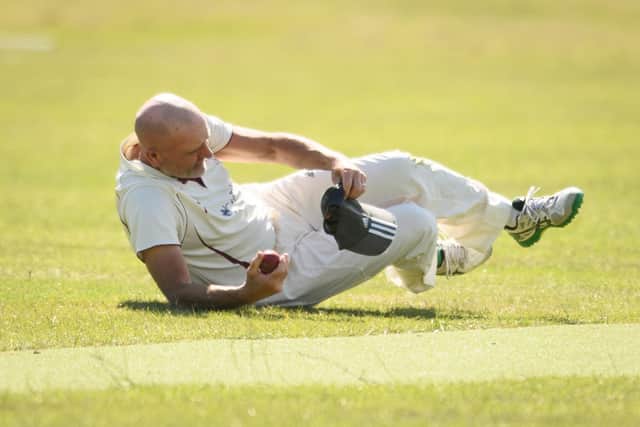 Portchester's Neal Hart takes a catch. Picture: Keith Woodland