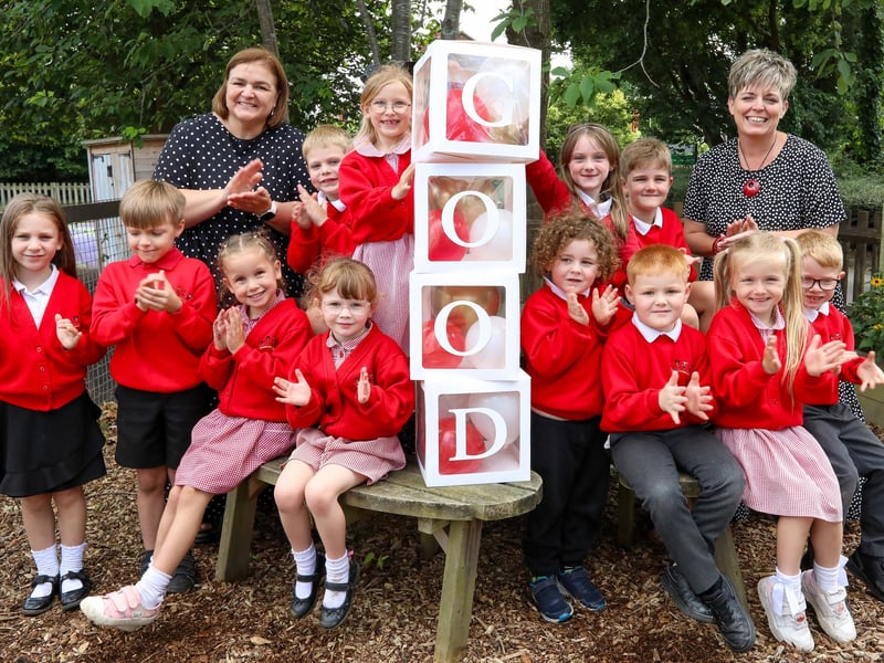 Children from the Bee Team and Year R are pictured with assistant head Ms Woodford, back left, and headteacher Mrs Bedson, back right. Rowner Infant School have received a 'Good' as a result of their Ofsted inspectionPicture: Chris  Moorhouse (100724-004)