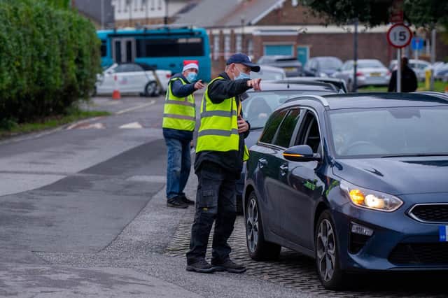 People are being encouraged to volunteer to help vaccinate others and get their booster jabs at St James Hospital, Portsmouth. Picture: Habibur Rahman