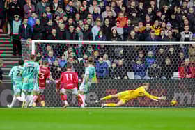 Anis Mehmeti grabs Bristol City's second in their 3-0 victory over Pompey. Picture: Nigel Keene/ProSportsImages