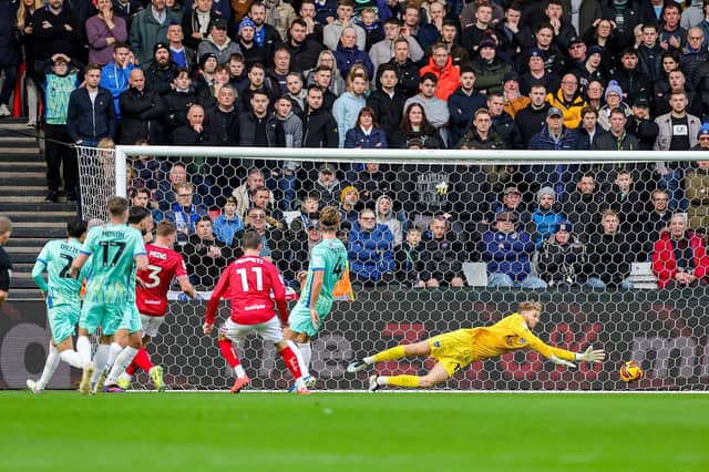 Anis Mehmeti grabs Bristol City's second in their 3-0 victory over Pompey. Picture: Nigel Keene/ProSportsImages