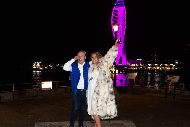 Harry Day, 24, and Chloe Brooks, 33, celebrating Spinnaker Tower revealing the gender of their baby girl. Picture: Emma Terraciano