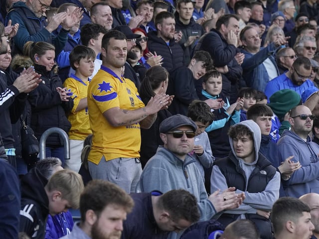 Pompey fans played a big role in carrying their team to a massive three points in their Championship survival battle against Blackburn Rovers.