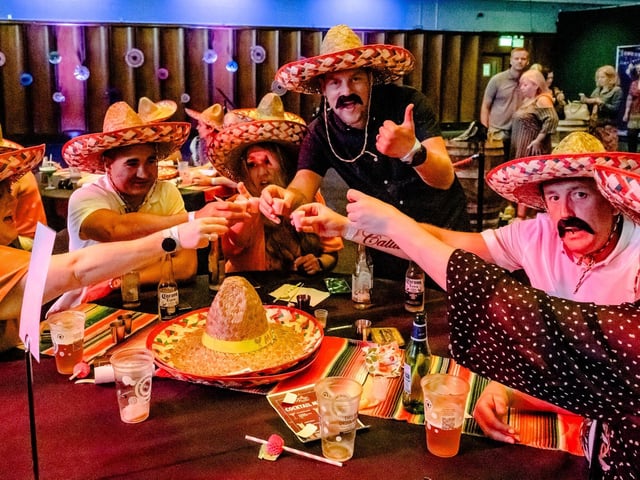 Pictured is: Guests prepare to drink some tequila.