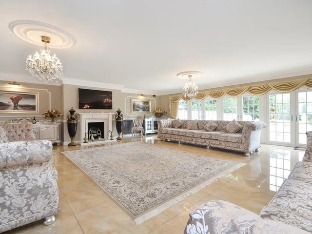 A fabulous reception area with huge double doors that led into the outside area.  Photo credit: Zoopla