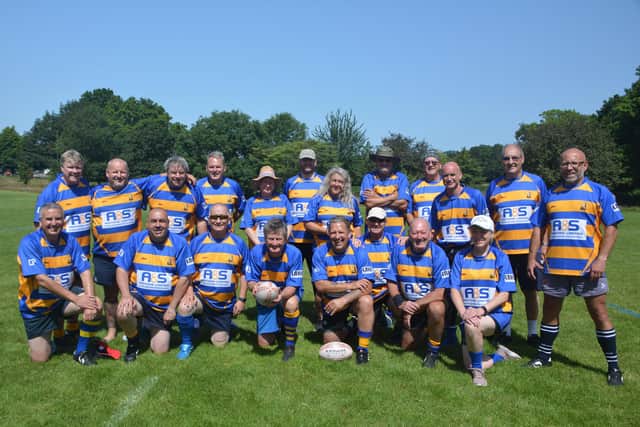 Gosport & Fareham Walking Rugby Club members in Guildford. Back (from left): Dougie Leask, Jon Ward, Chris Davis, Stuart Parsons, Lynn Davis, Gavin Bridges, Rachel Owen, Mike Greenslade, Howard Smith, Keith Stephenson, Byron Lewis, Matthew Webb. Front: Colin Potter, Tony Buckley, Jerry Rawlings, Ken Smart, Malcolm Richards, Martin Webb, Alan Hall, Jenny Rawlings.