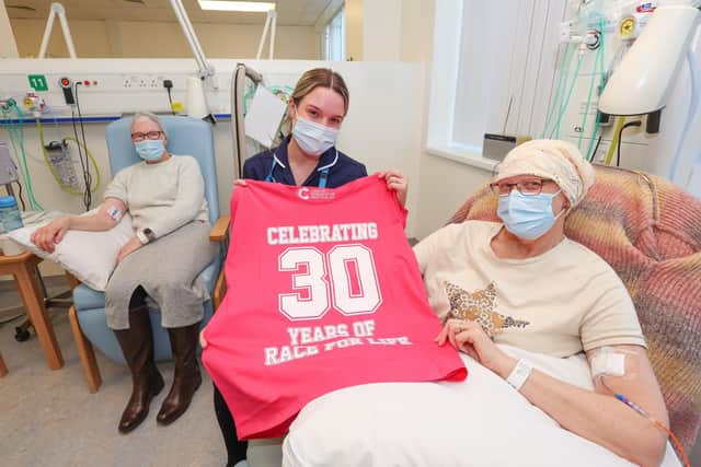 haematology and oncology day unit manager Maria Dark with breast cancer patients Catherine Day (L) and Lisa Bailey (r)