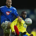 Pompey's Ivica Mornar battles with Arsenal's Sol Campbell in the FA Cup quarter-finals in March 2004 (Picture Phil Cole/Getty Images)