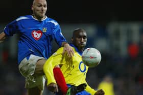 Pompey's Ivica Mornar battles with Arsenal's Sol Campbell in the FA Cup quarter-finals in March 2004 (Picture Phil Cole/Getty Images)