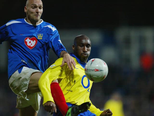 Pompey's Ivica Mornar battles with Arsenal's Sol Campbell in the FA Cup quarter-finals in March 2004 (Picture Phil Cole/Getty Images)