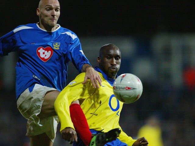Pompey's Ivica Mornar battles with Arsenal's Sol Campbell in the FA Cup quarter-finals in March 2004 (Picture Phil Cole/Getty Images)