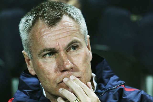 Peter Taylor helped out with Pompey's wingers in Tuesday's training session. Picture: Bryn Lennon/Getty Images