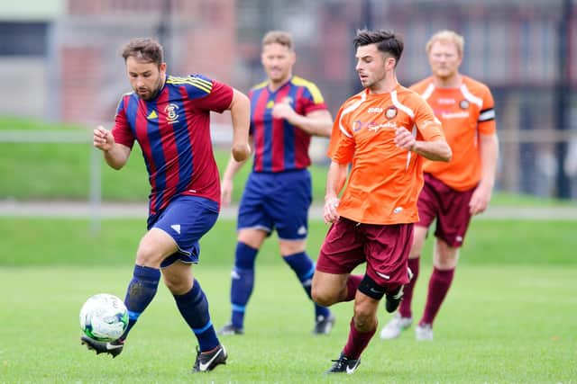 Sean Snelling, left, in action for US Portsmouth against New Milton in 2015. Picture: Allan Hutchings
