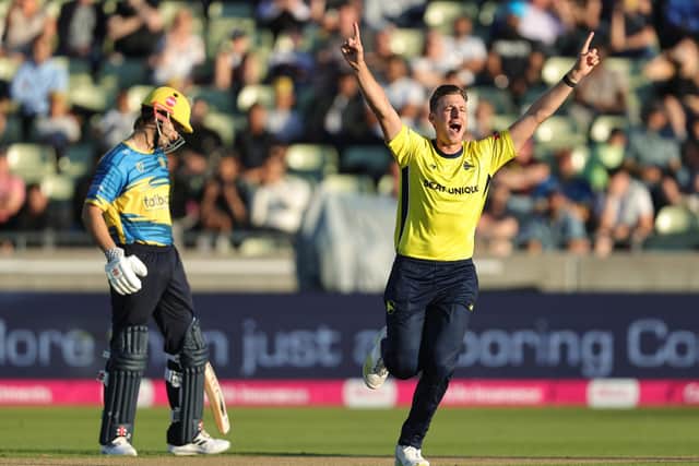 Hampshire's Brad Wheal celebrates after taking the wicket of Alex Davies. Photo by David Rogers/Getty Images