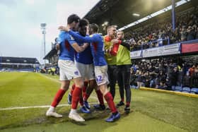 The South Stand celebrates alongside Ellis Harrison and his Pompey team-mates following his goal against Shrewsbury last season