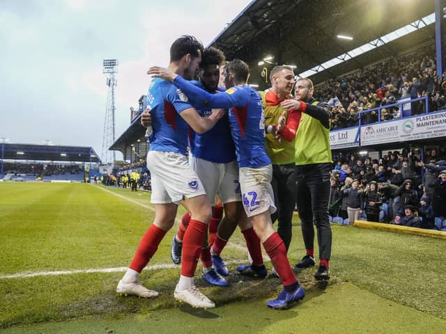 The South Stand celebrates alongside Ellis Harrison and his Pompey team-mates following his goal against Shrewsbury last season