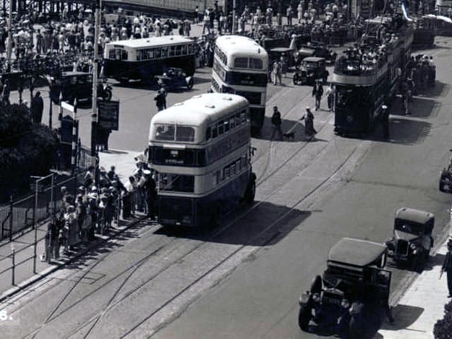 Southsea Esplanade in the 1930s. Packed trams and buses on a sunny day when public transport was reliable. the peak for the number of bus passengers carried in Portsmouth came in 1948 when nearly 88 million journeys were made. The nearest tram, with passengers on top enjoying the fine weather, is on its way to Milton.