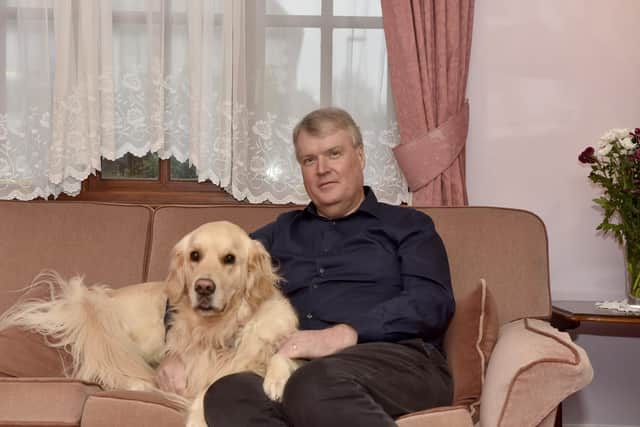 Pictured is: Seán Woodward with his dog Skye (2).
Picture: Sarah Standing (080224-6826)