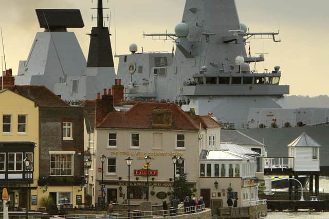 HMS Dauntless, then the Royal Navy's newest warship enters Portsmouth for the first time on December 2, 2009. The Type-45 destroyer was launched in January 2007 from Govan shipyard in Glasgow. Picture: Chris Ison/PA Wire.