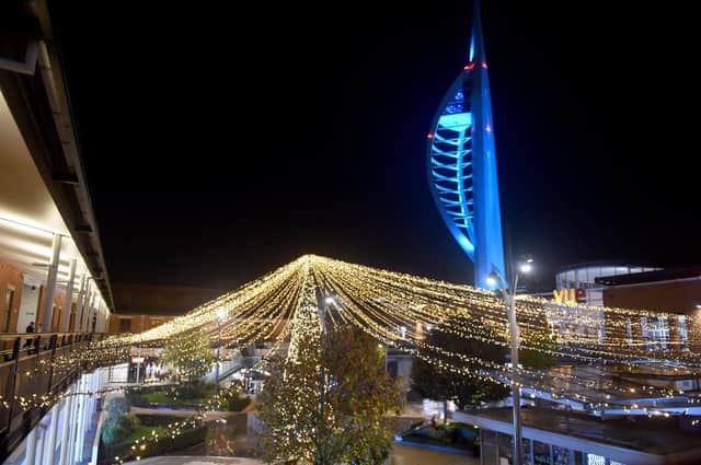 Christmas lights and decorations are being put up across Gunwharf Quays. Picture: Sarah Standing (041122-5249).
