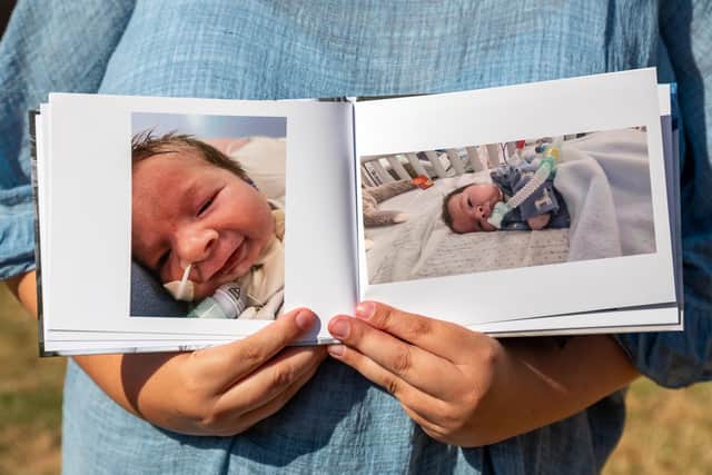 The photobook which records the short life of Katie's son Harrison. Picture: Mike Cooter (130822)