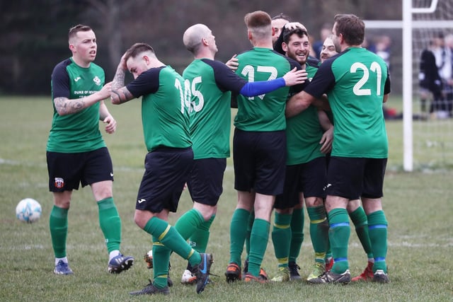 Saturn Royale celebrate a goal. Picture by Stuart Martin