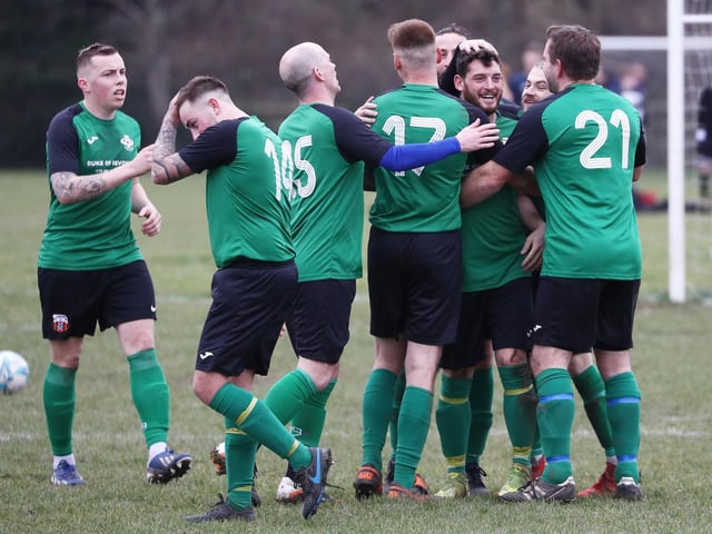 Saturn Royale celebrate a goal. Picture by Stuart Martin