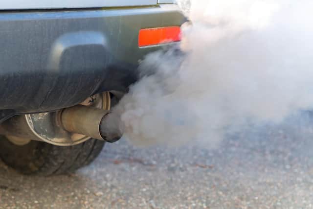 Thick smoke pours from the exhaust of a car. Picture: Getty Images/iStockphoto