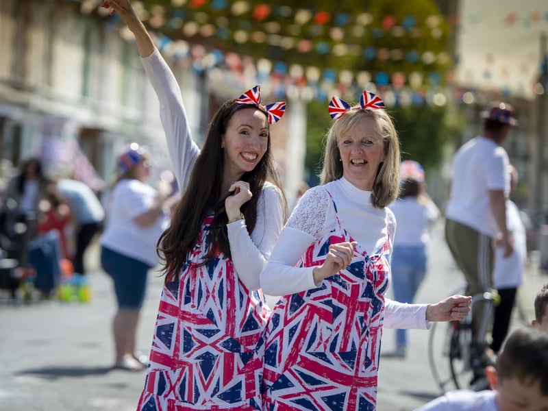 Megan Thacker and mum Joyce Gosling dance at the Agincourt Road street party