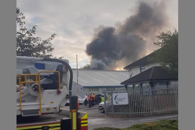 Fire crews and South Central Ambulance Service are in Airport Service Road in Copnor on October 13 after a fire at Portsmouth Aviation. Picture: Harry Mills
