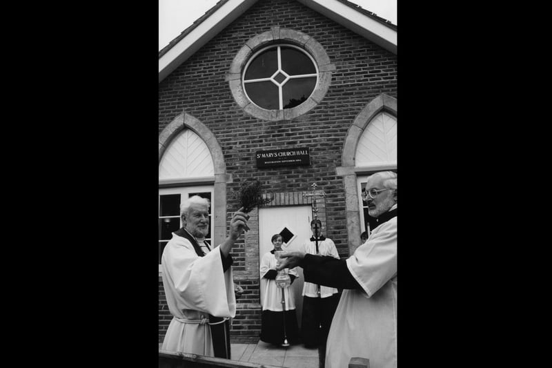 The Rev Royle blesses the new St Mary's Church hall, Hayling assisted by Roger Harrison, Roy Broadhurst, Judith Day and Daniel Gardner in 1994. The News PP4855