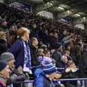 Pompey fans backed their team to a crucial Championship survival win over Cardiff last night.