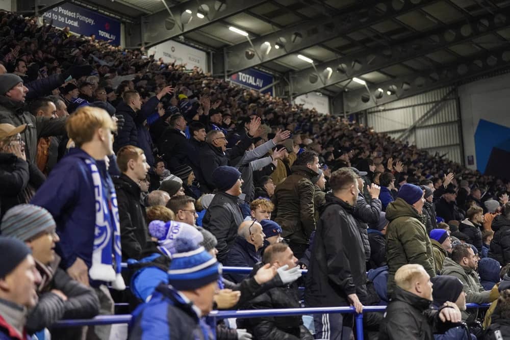 Pompey fans backed their team to a crucial Championship survival win over Cardiff last night.
