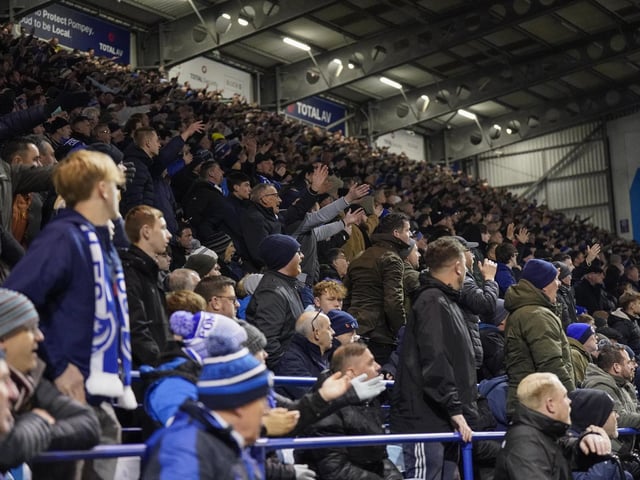 Pompey fans backed their team to a crucial Championship survival win over Cardiff last night.
