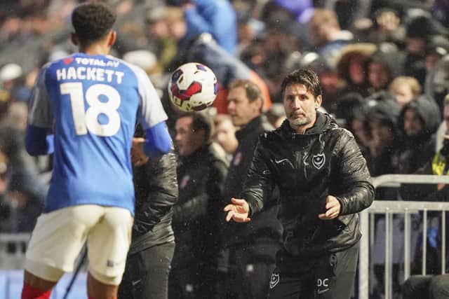 Danny Cowley throws the ball to Recco Hackett during Sunday's defeat to Charlton