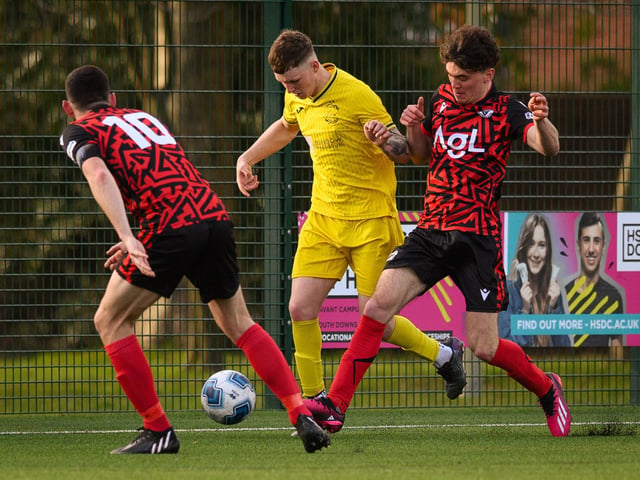 Action from Harvest's 4-1 win at home to Locks Heath (red and black kit) in the Hampshire Premier League. Picture: Keith Woodland (180321-1271)