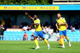 Abdulai Baggie celebrates one of his two debut goals against Merthyr. Picture by Tom Phillips