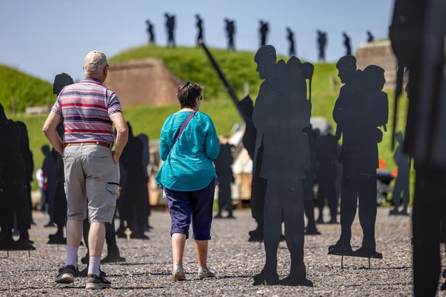 Visitors explore the installation at the Royal Armouries.